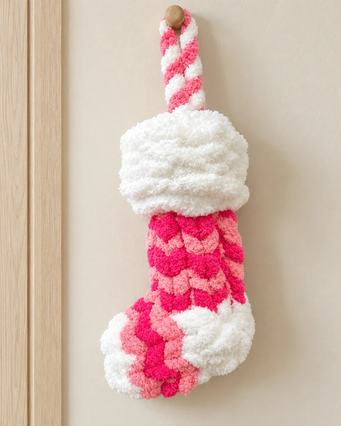 Pink and white Fireside Cheer Christmas stocking