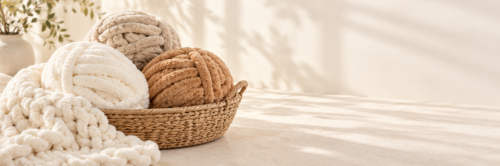 HOMBYS chunky chenille yarn on a continuous light ivory campaign background
